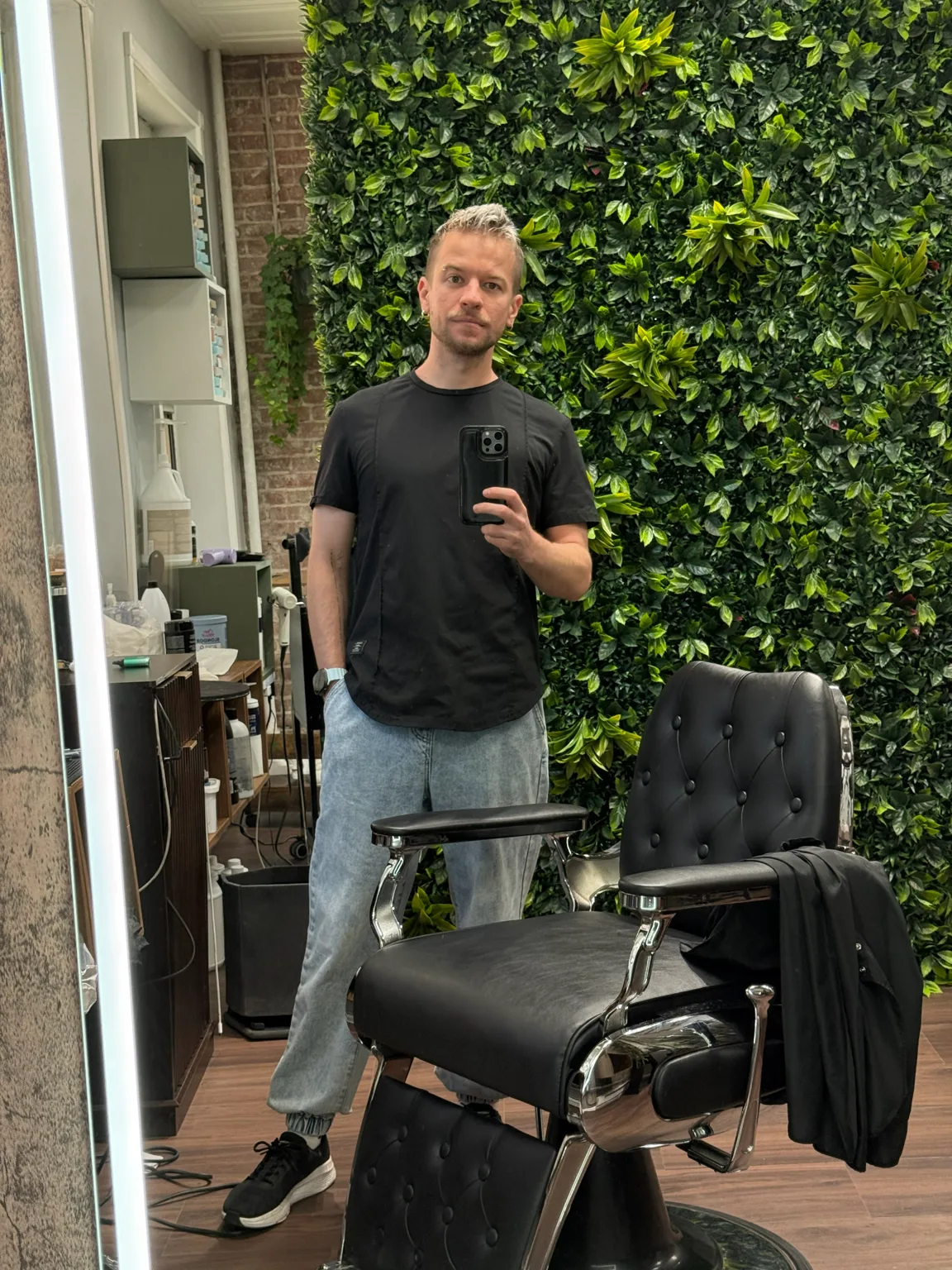 Maksym Max Meshkov inside his private barber studio in Manhattan